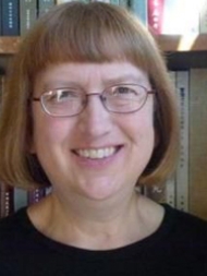 Headshot of Nancy Steinhardt, wearing glasses and smiling