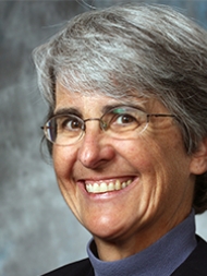 Headshot of Margery Austin Turner, smiling